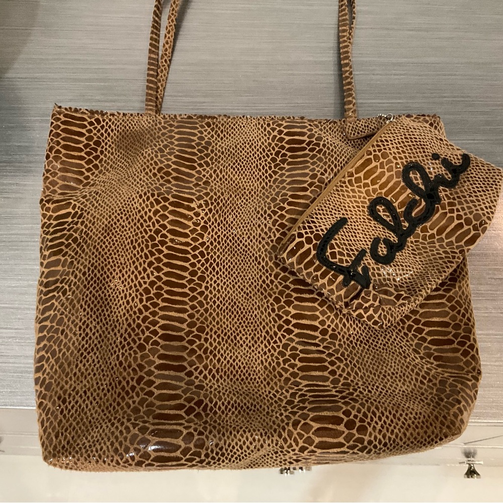 Carlos Falchi python bag. Converts from clutch to shoulder bag.